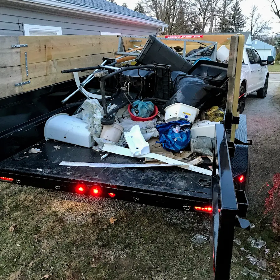 Roll-off dumpster delivered to a residential driveway in Las Flores
